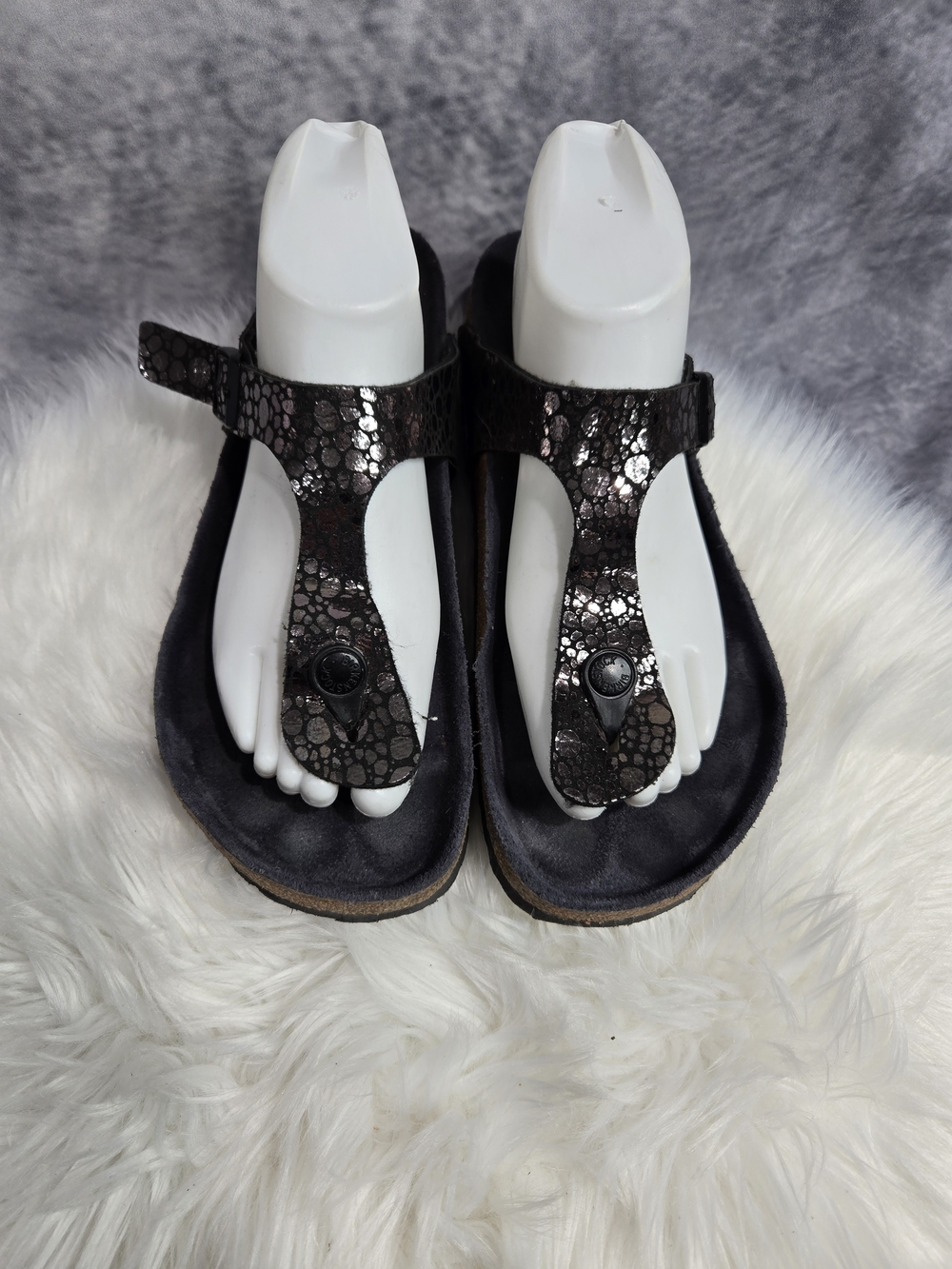 Birkenstock Gizeh sandals in a Metallic Stones Black finish.